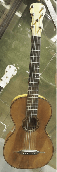 Почему во всем мире у гитар 6 струн, а в России – 7