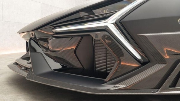 Плюс 55 сил и много карбона. В Mansory доработали Lamborghini Revuelto Плюс 55 сил и много карбона. В Mansory доработали Lamborghini Revuelto